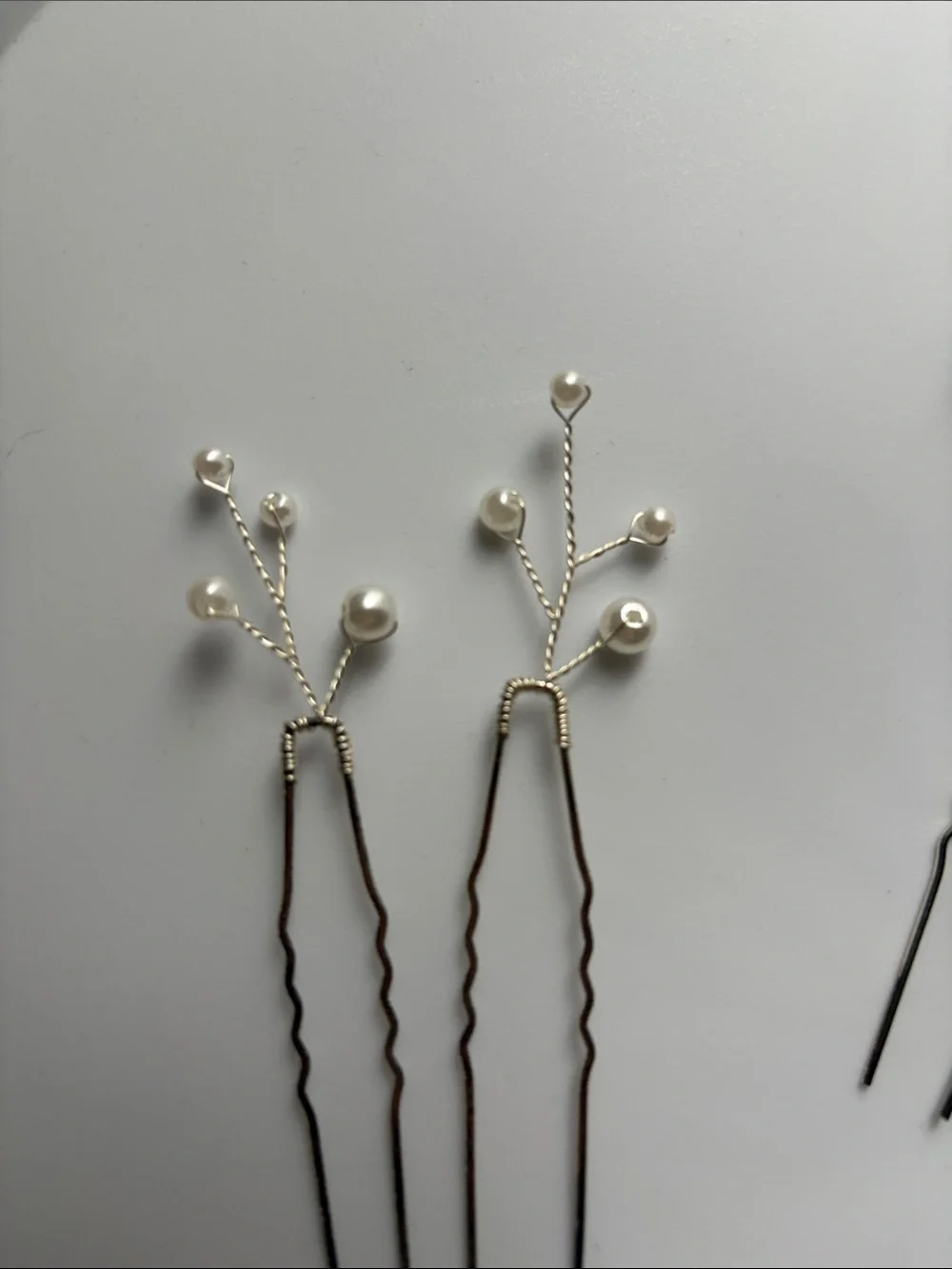 Pearl and silver decorative hair pins